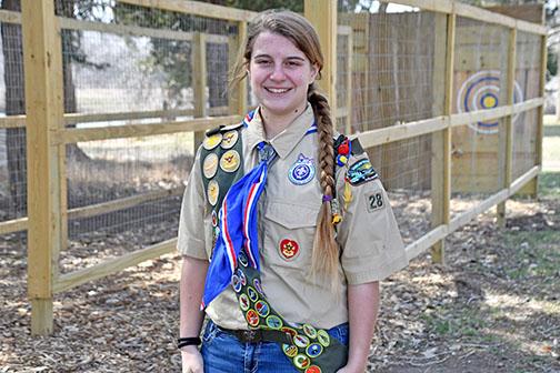 Aurora senior Kimberly Evans stands in front of her hatchet target set as part of her Eagle Scout Service Project. She is projecting to have her Eagle Scout Court of Honor on Saturday, April 6.