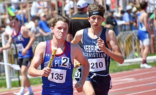 Lance Russell was determined to win in his final days wearing HPC blue and red, helping the Storm to a gold medal in the 3200 relay and also finishing third in the 1600 relay over the weekend. 