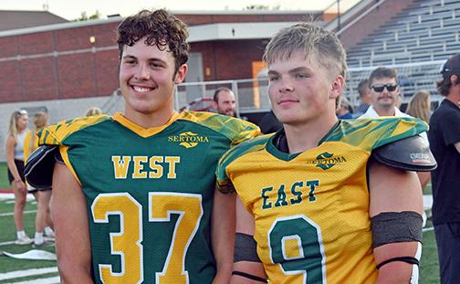 Giltner’s Taylor Smith (37) and High Plains Community’s Wyatt Urkoski (9) posed for a photo together following Saturday’s 47th annual Sertoma 8-man all star game played at Hastings College. Smith played on the West team, which picked up a 22-6 win over Urkoski’s East squad. 